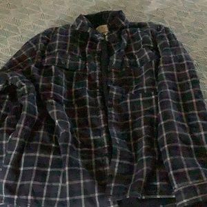 New w tags never worn. Fleece inside flannel shirt